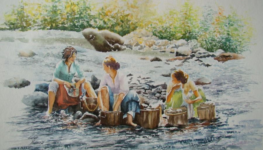 Jeunes filles lavant le linge à la rivière